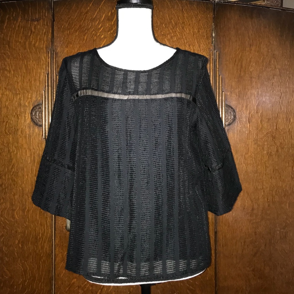Black unique blouse from Anthropologie